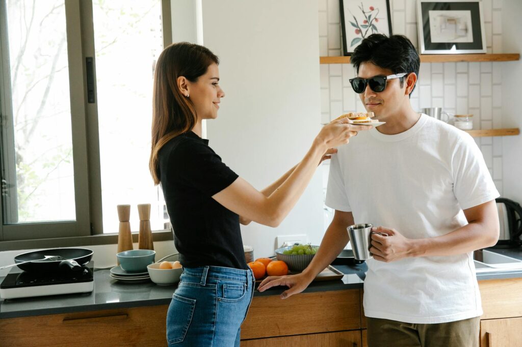 Photo Of Woman Feeding A Man