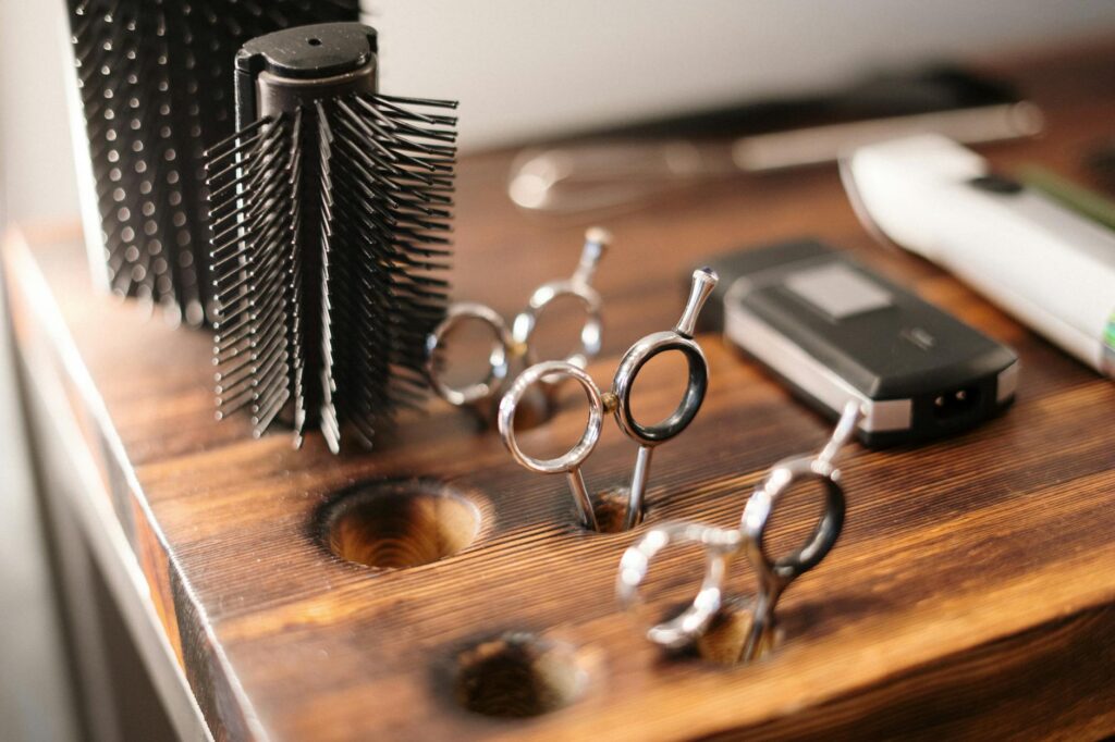 Black and Silver Skeleton Key on Brown Wooden Table