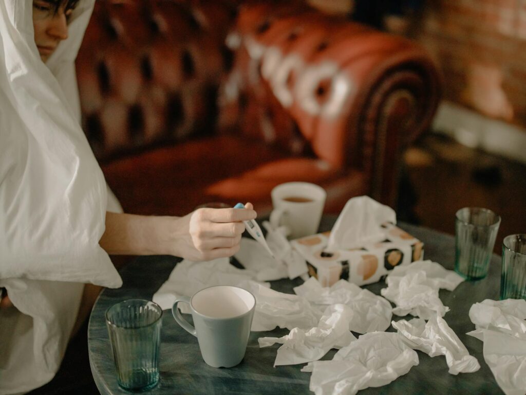 Person Holding White Ceramic Mug